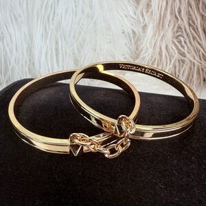 Victoria Secret goldtone, bangle set connected via chain bracelet